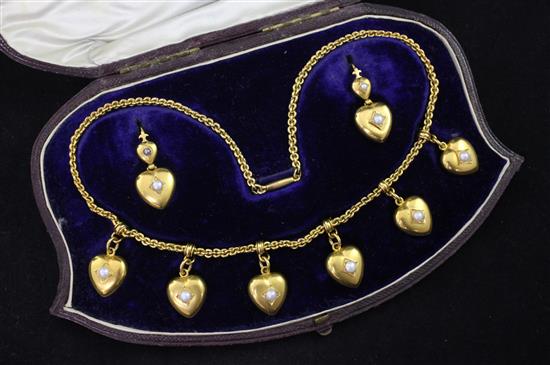 A cased Victorian gold and split pearl demi-parure, necklace 16in.